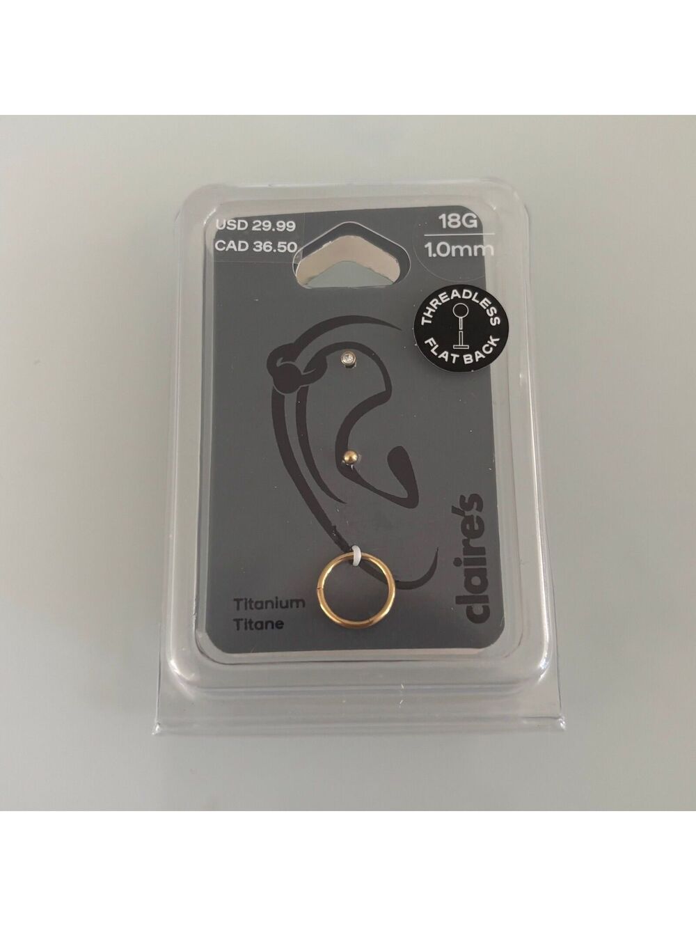 Claire’s 3 titanium earrings